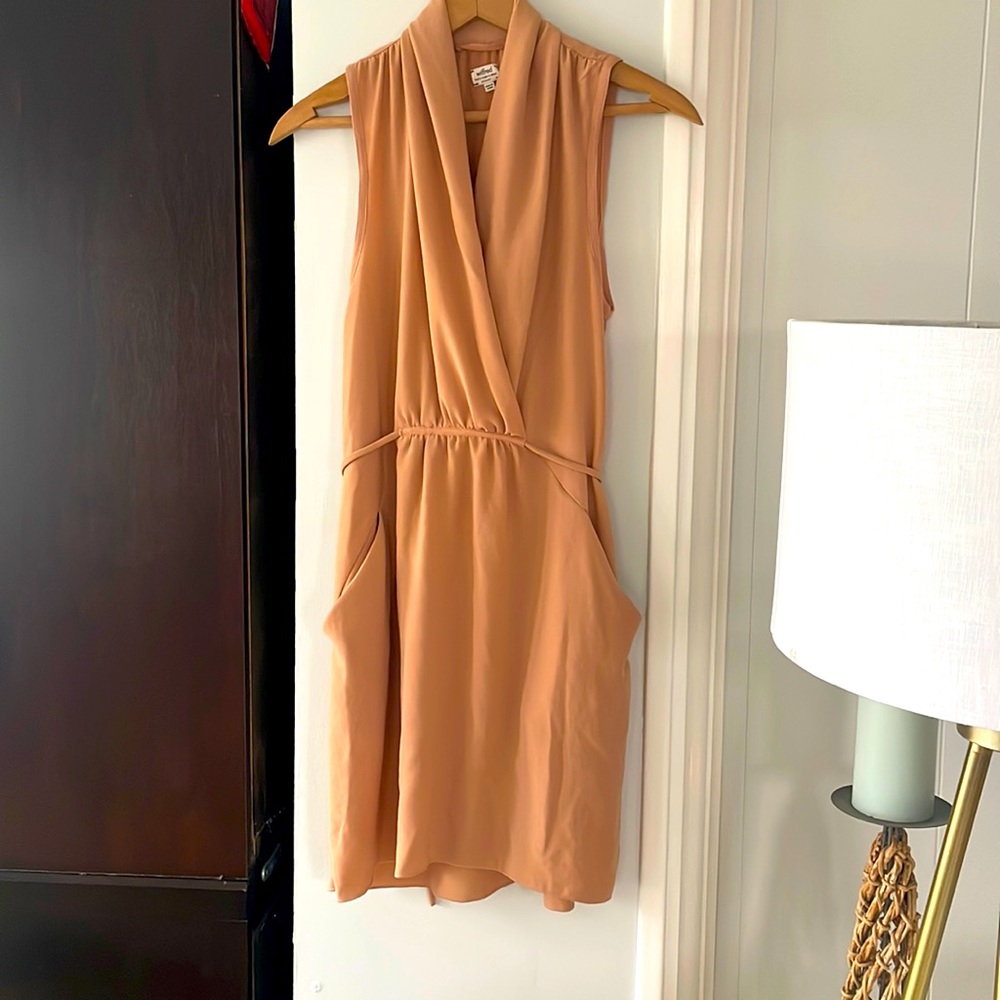 Nude colored sleeveless dress